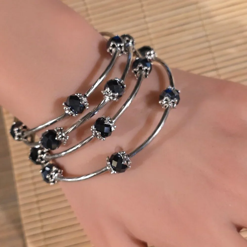Silver Tone Crystal Wrap Bracelet With Black Faceted Beads & Filigree Details